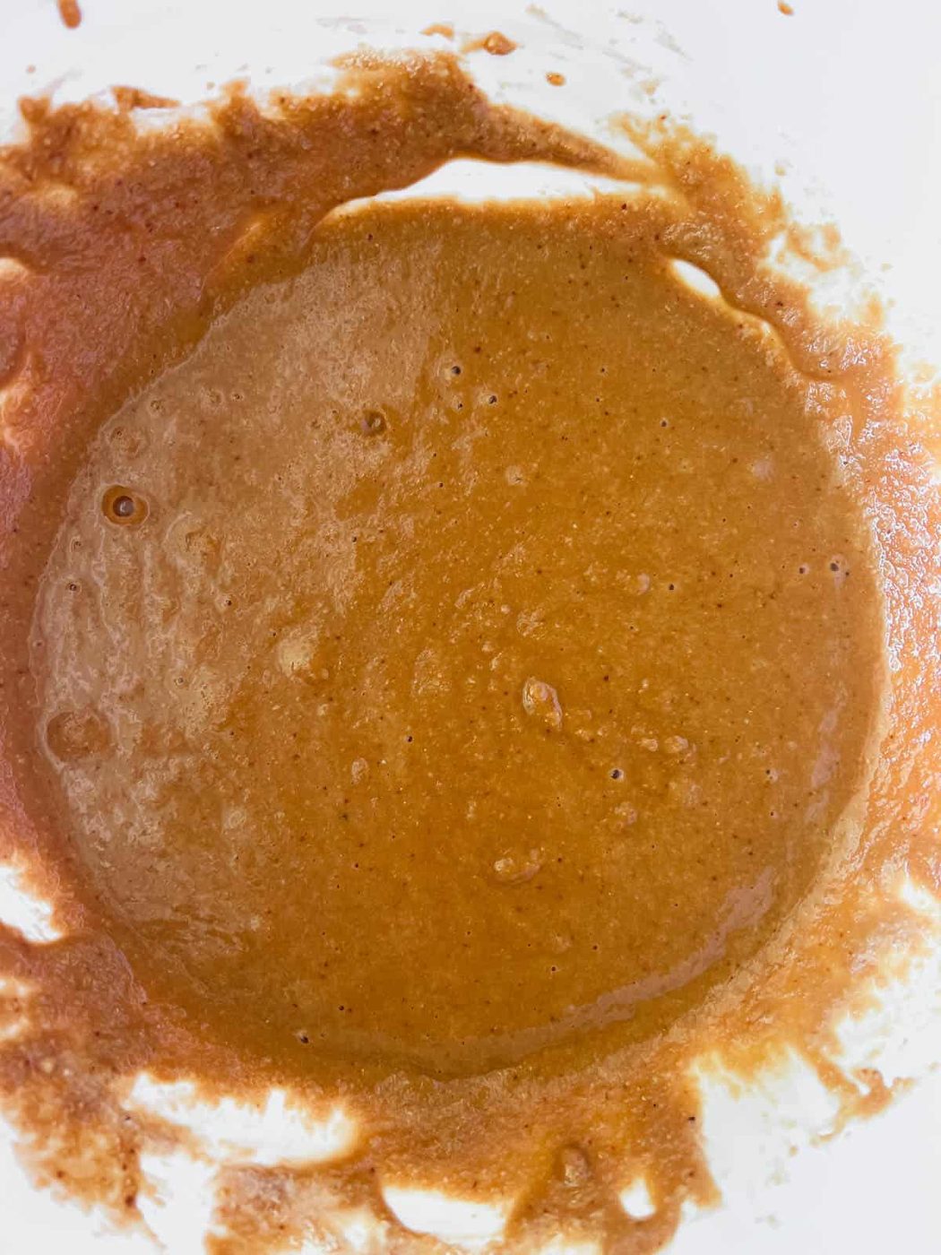 The dry and wet ingredients all mixed together in a bowl.