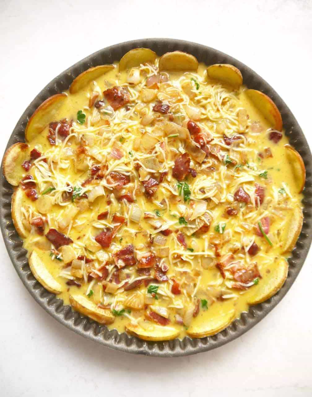 Gluten free quiche lorraine before baking.