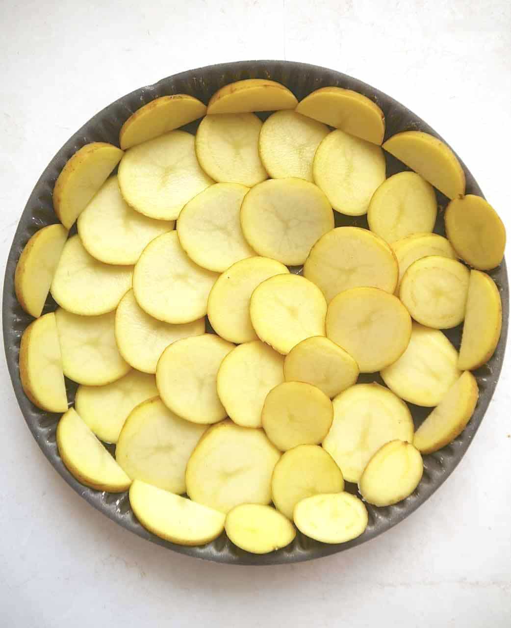 Quiche recipe with potato crust. Making the potato curst.
