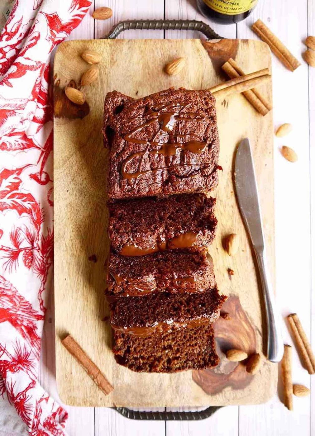 Sliced gluten free gingerbread on a serving tray.