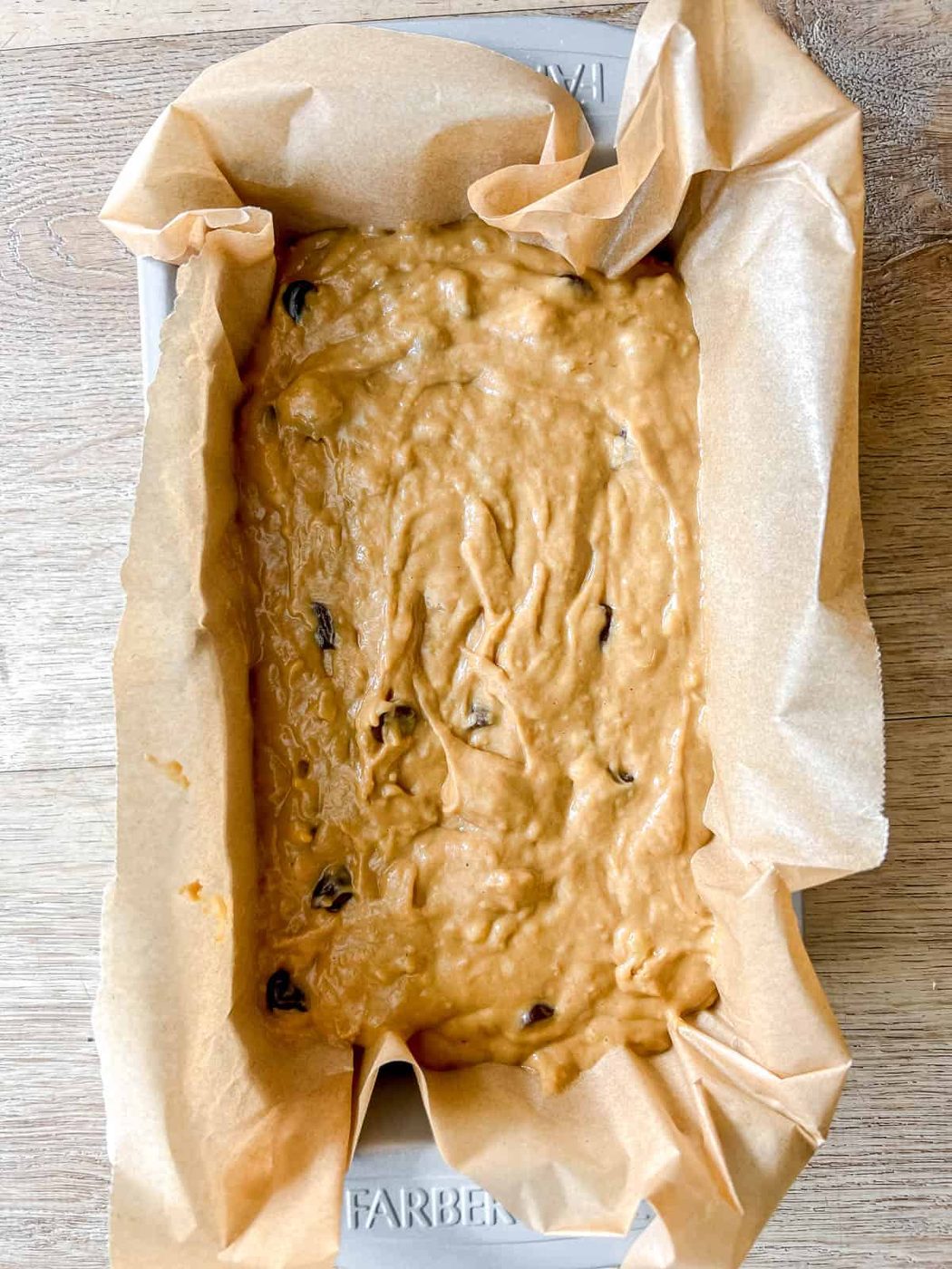 Greek yogurt banana bread in a pan before baking.