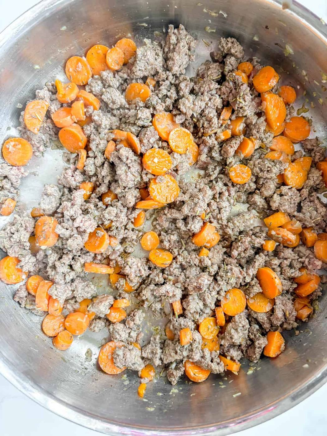Ground beef added to the carrots.