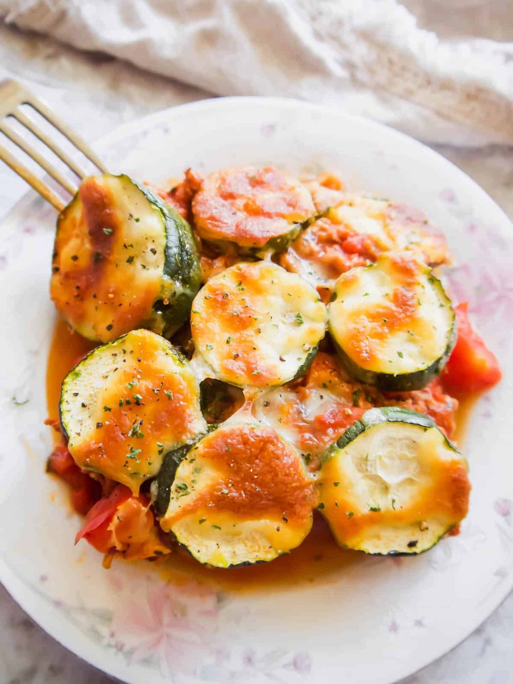 Lasagna without noodles on a plate.