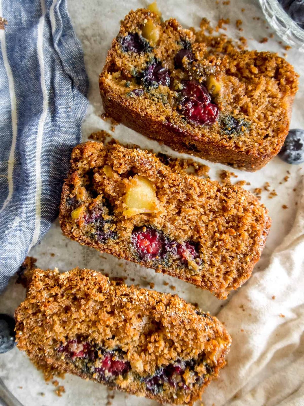 3 slices of almond flour blueberry bread in a row.