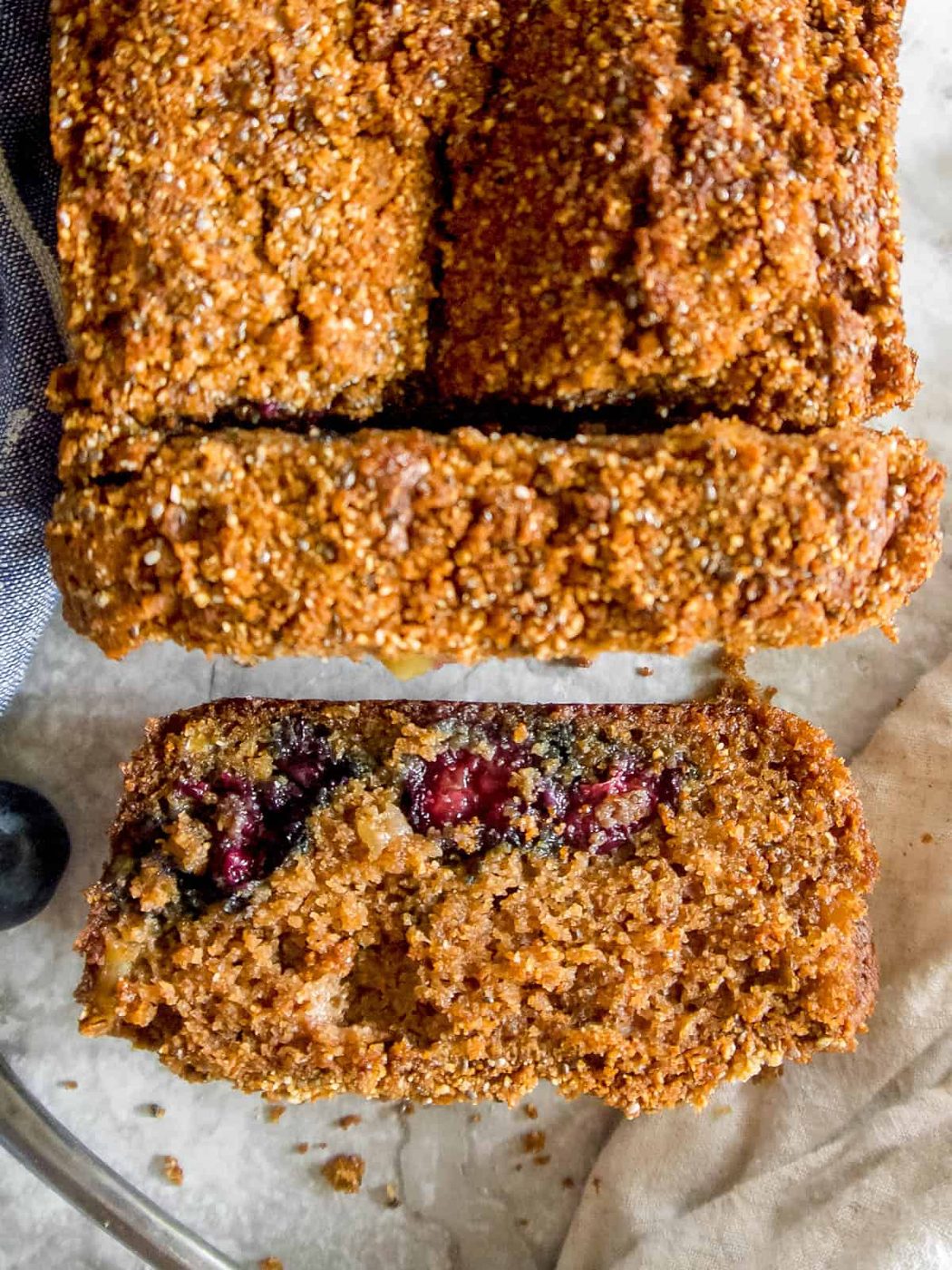 A slice of Paleo apple bread on a table.
