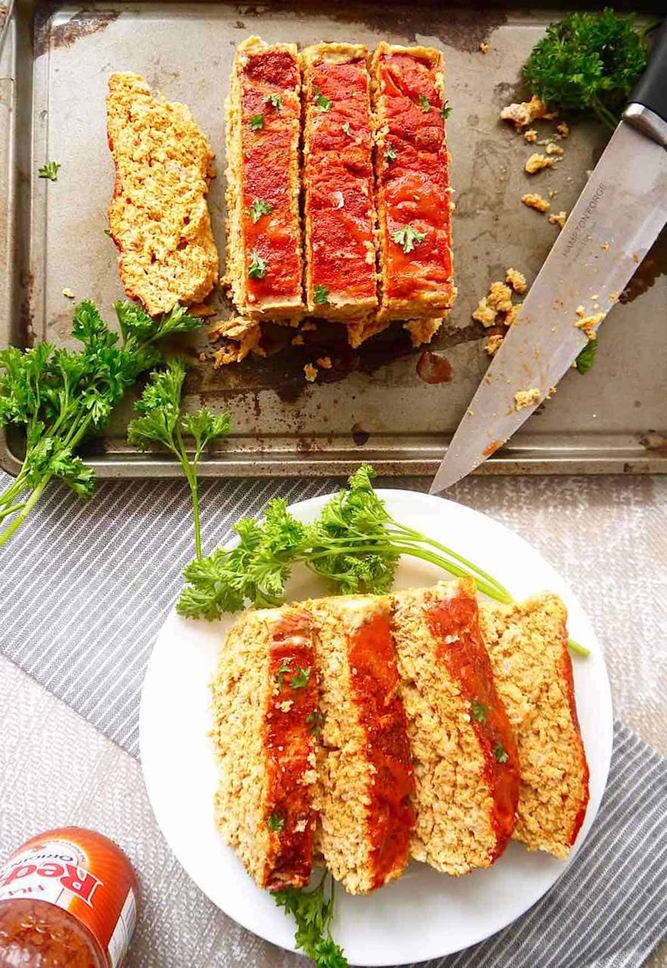 Sliced buffalo meatloaf on a pan.