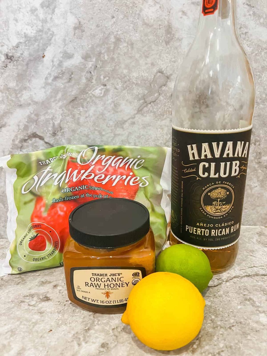 Ingredients needed to make a skinny strawberry daiquiri.