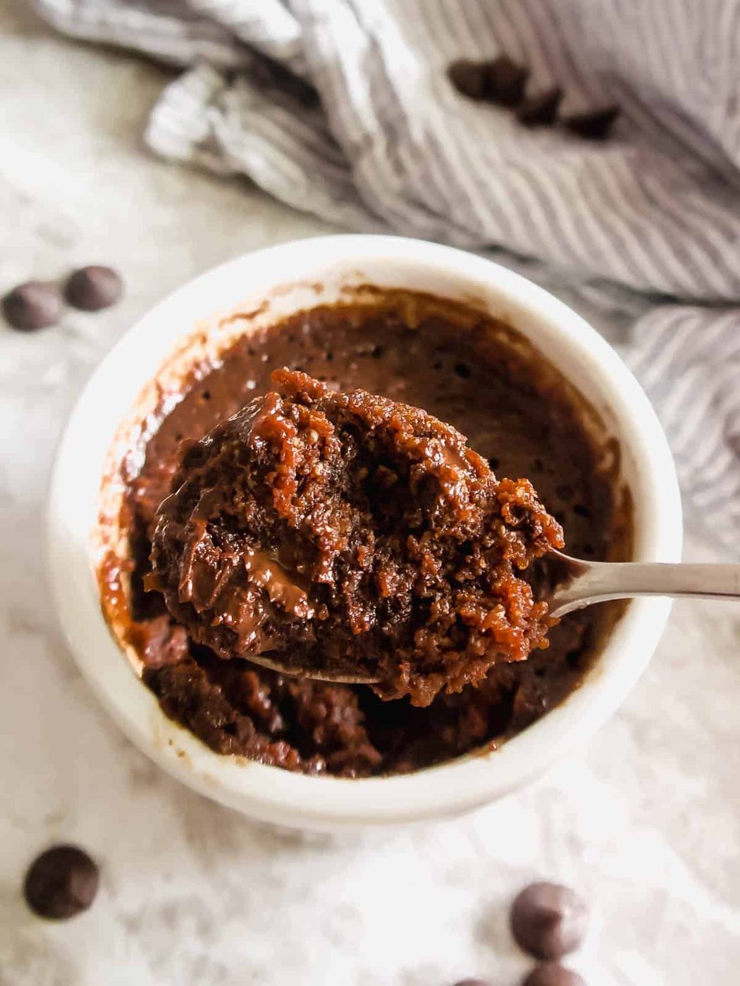 A scoop of a Paleo mug brownie in a spoon.