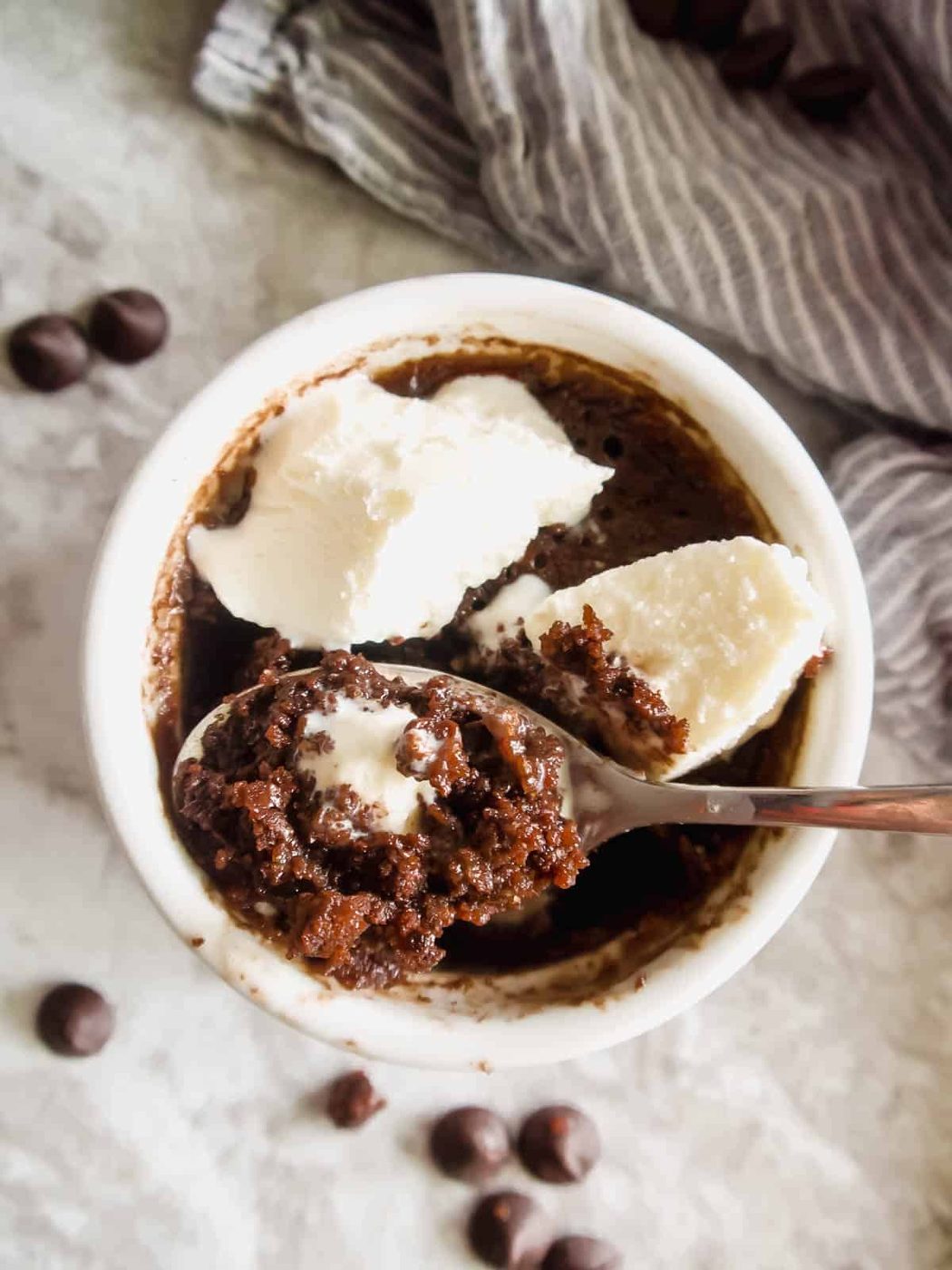 Lighter microwave brownie with ice-cream on top.
