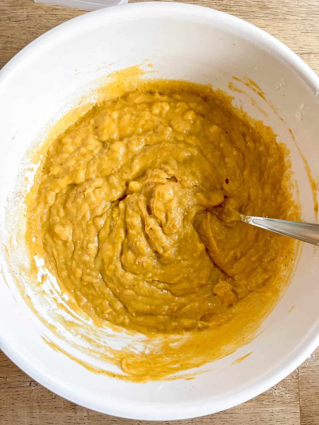 Pumpkin banana bread batter in a bowl.