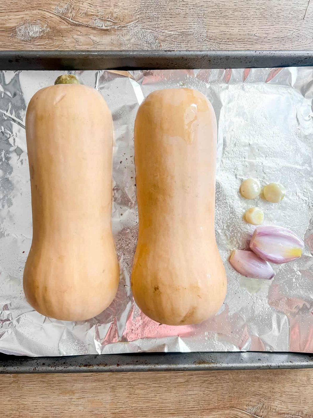 Butternut squash before baking in a pan.