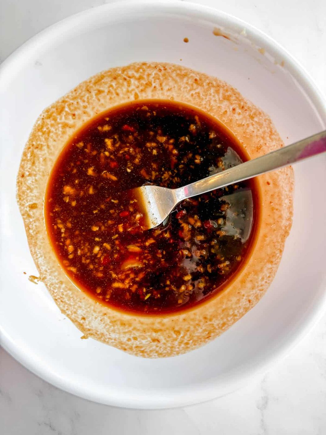Honey garlic sauce in a bowl.