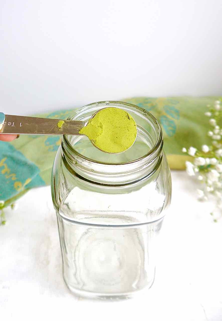 Ceremonial grade matcha powder about to go into mason jar.
