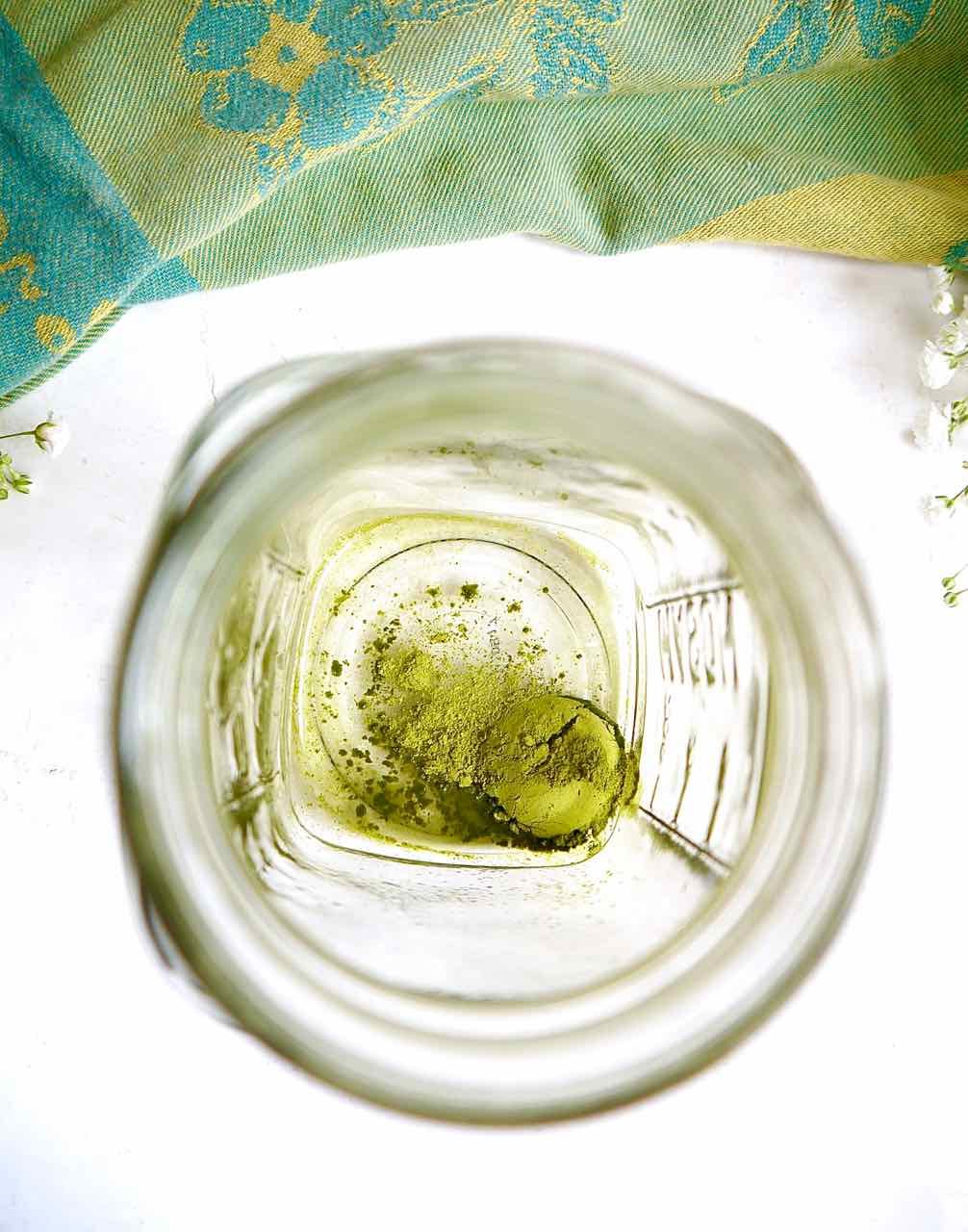 Matcha powder in cup.
