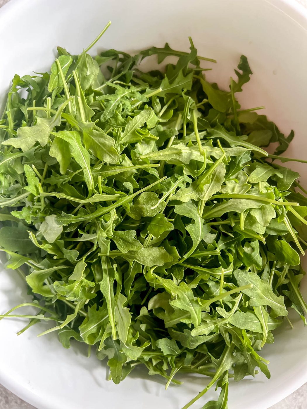 Arugula in a bowl.