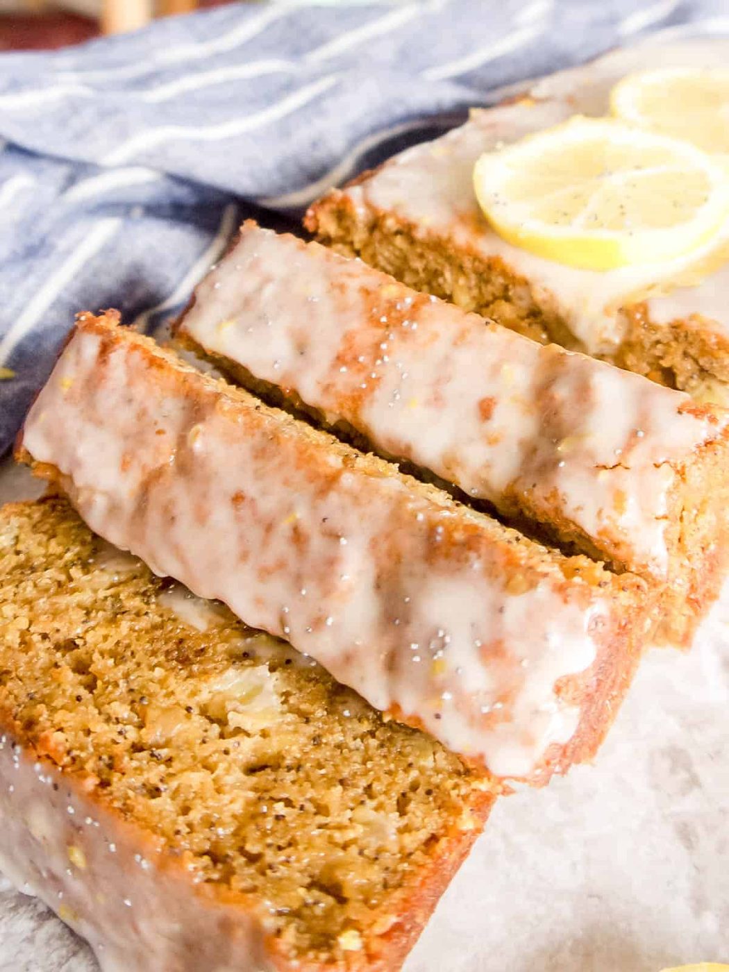 Gluten free lemon poppy seed bread that has been freshly sliced.
