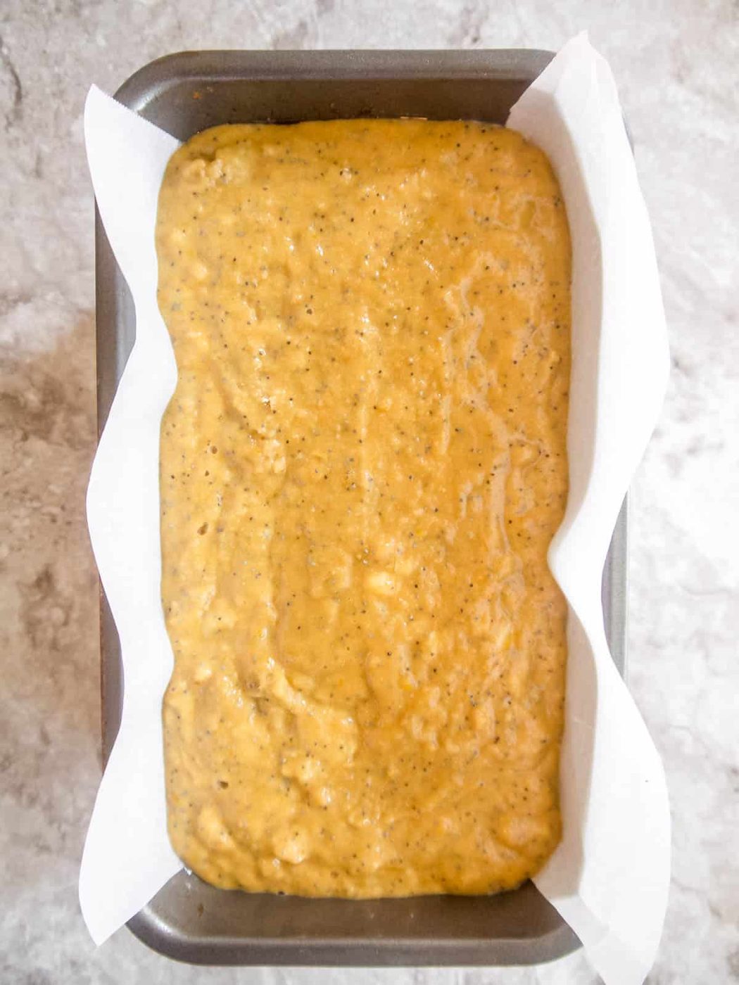 Paleo lemon banana bread batter in a pan.