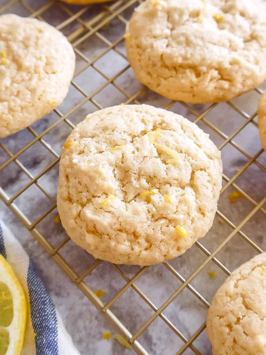 Lemon sugar cookies freshly baked and on a drying rack.