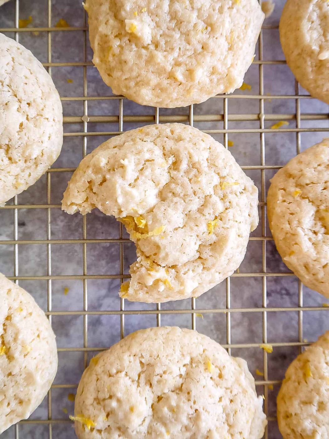 A bite of a lemon sugar cookie with olive oil.