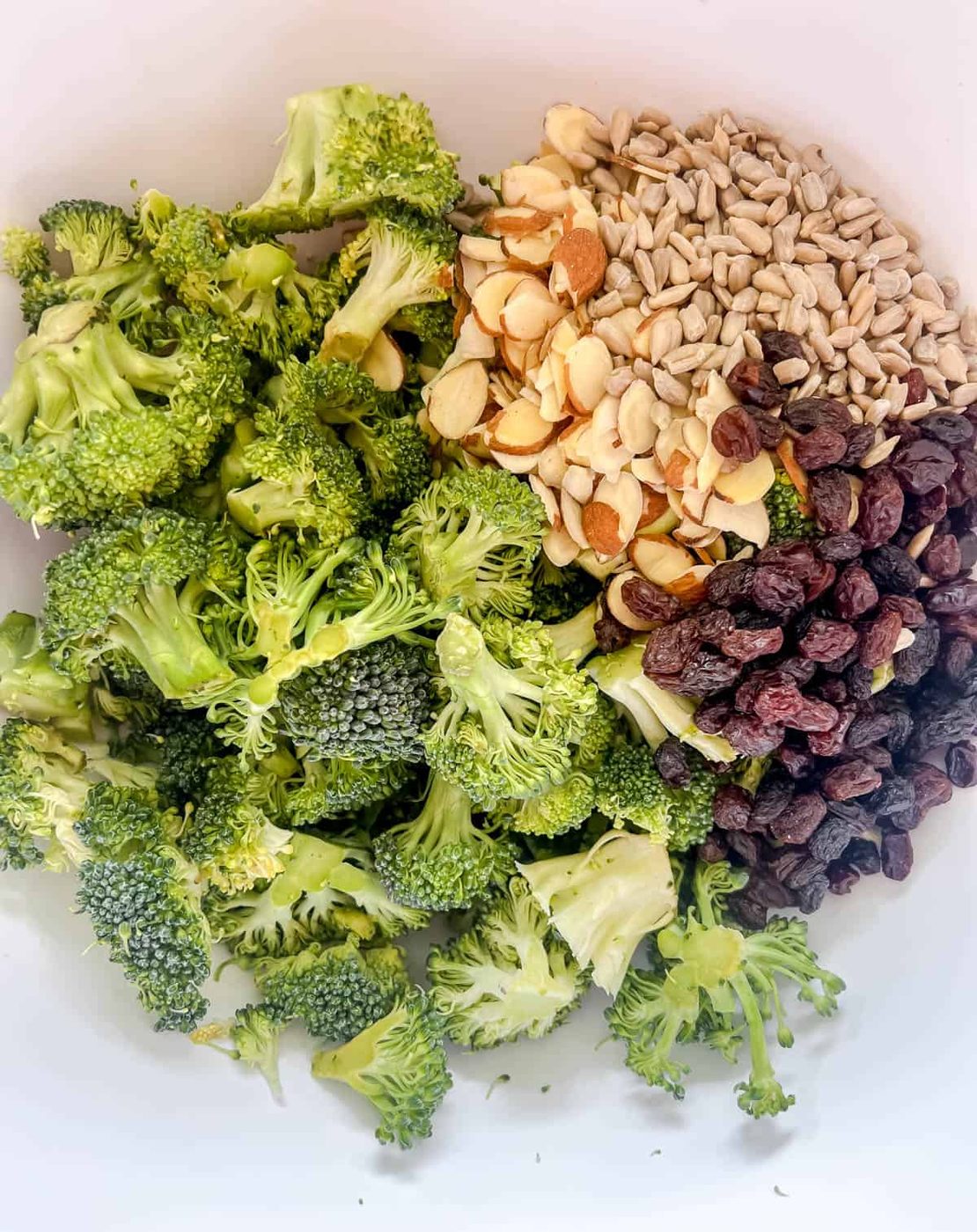 All the parts of the salad in a bowl.