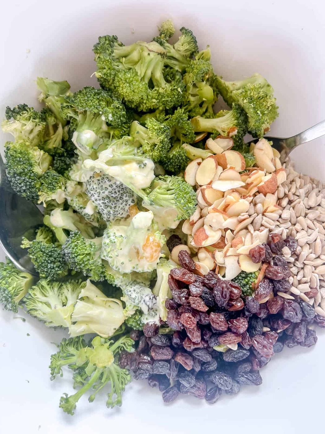 The dressing added to the bowl.
