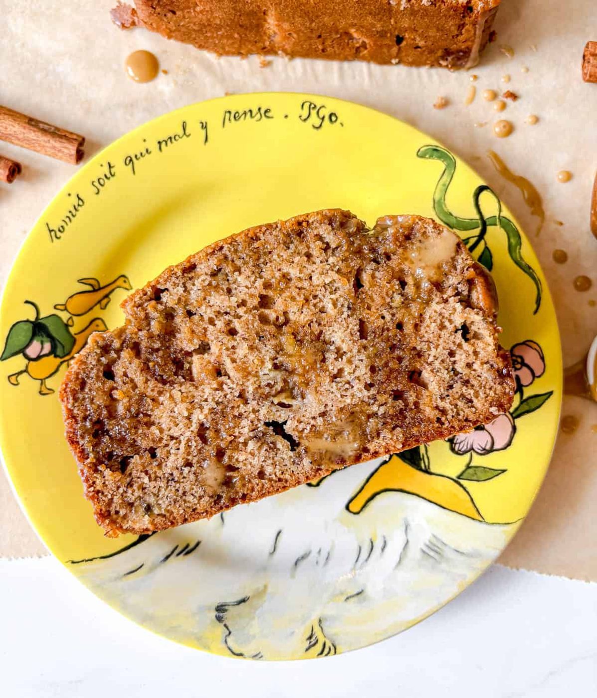 Slice of maple banana bread on a plate.