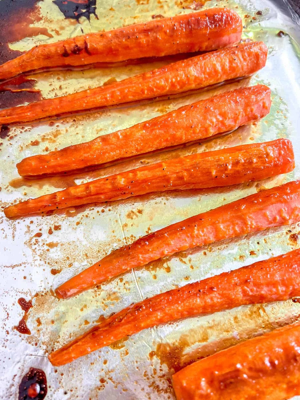 Turmeric carrots with maple syrup roasted in the oven.