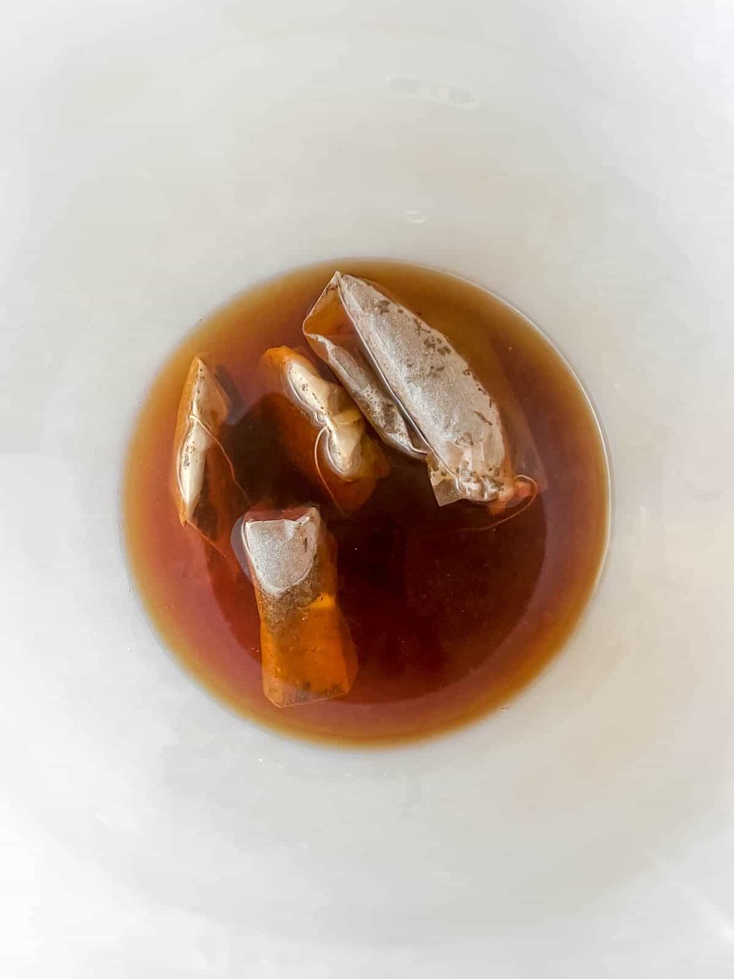 Tea bags in hot water.