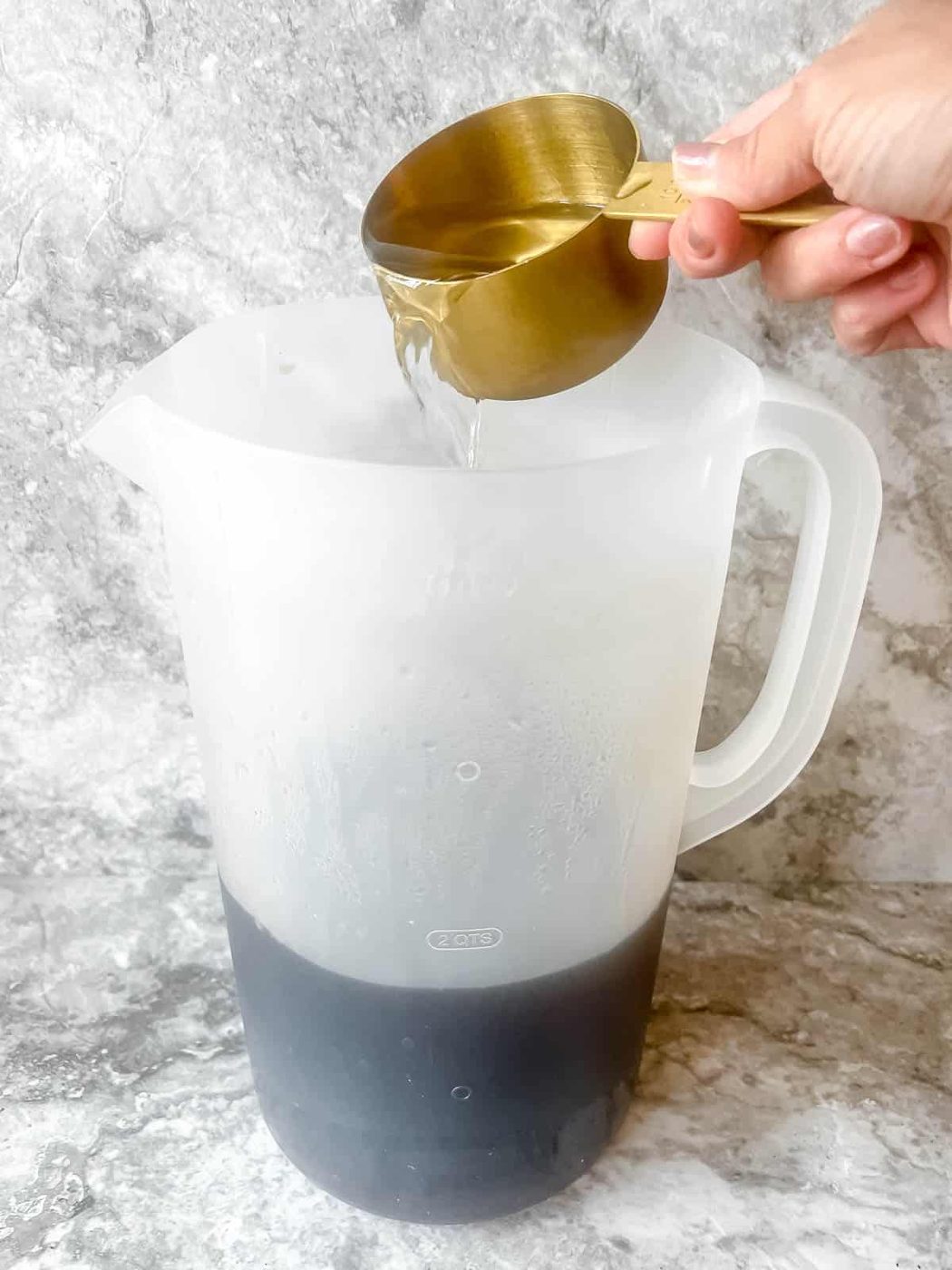 Cold water added to iced tea.