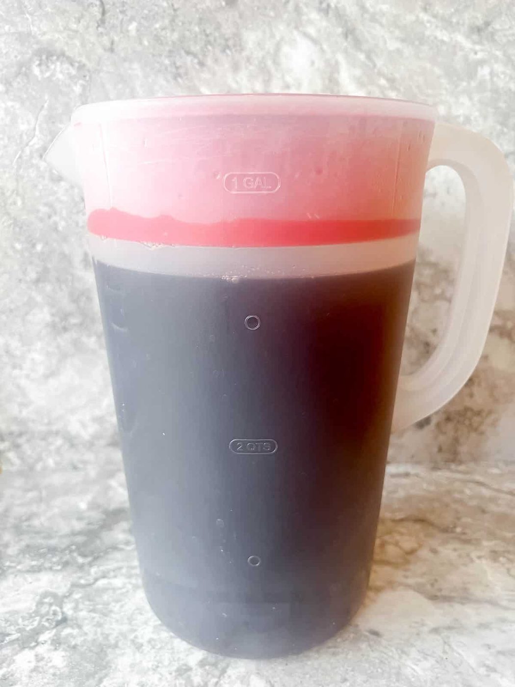 Iced tea with maple syrup before refrigeration.