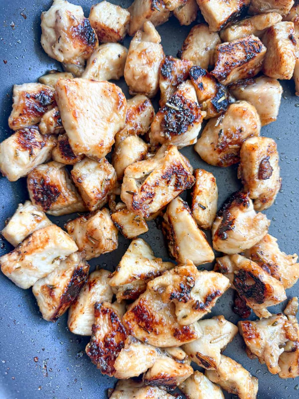 Maple chicken grilled in a pan.