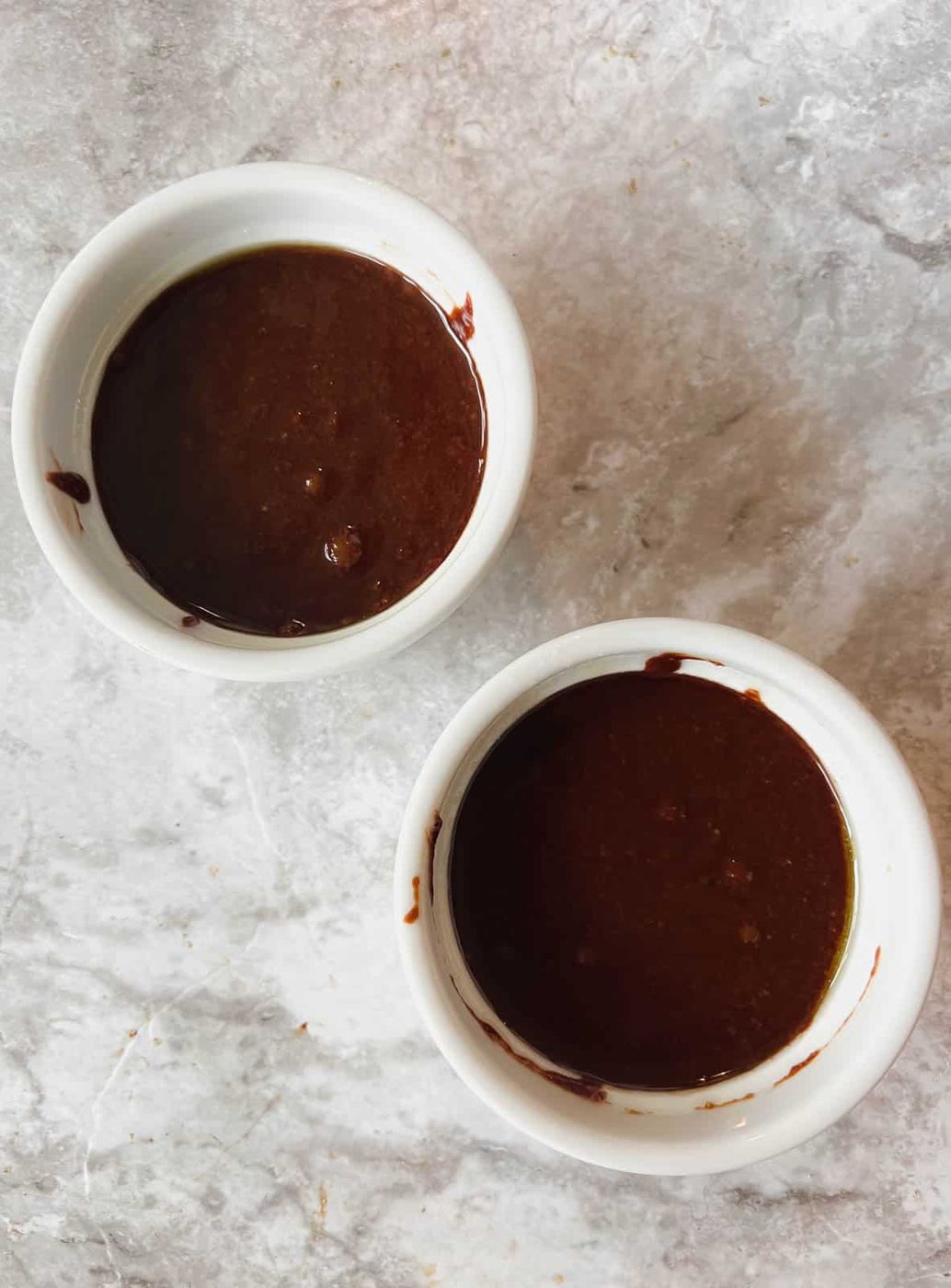 Batter added to each ramekin.