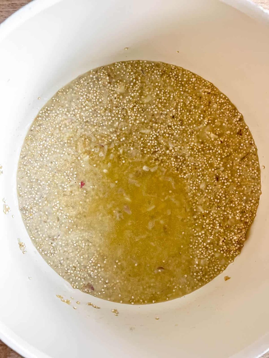 Chicken stock added to the pan.