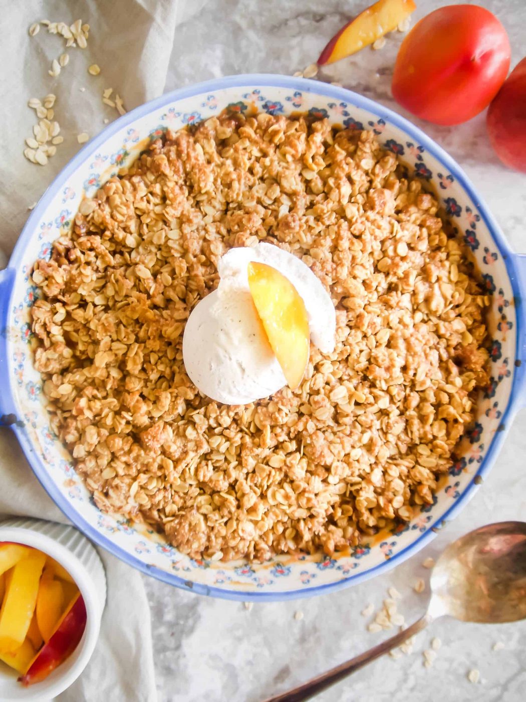 Nectarine Crisp recipe, freshly baked with ice-cream on top.