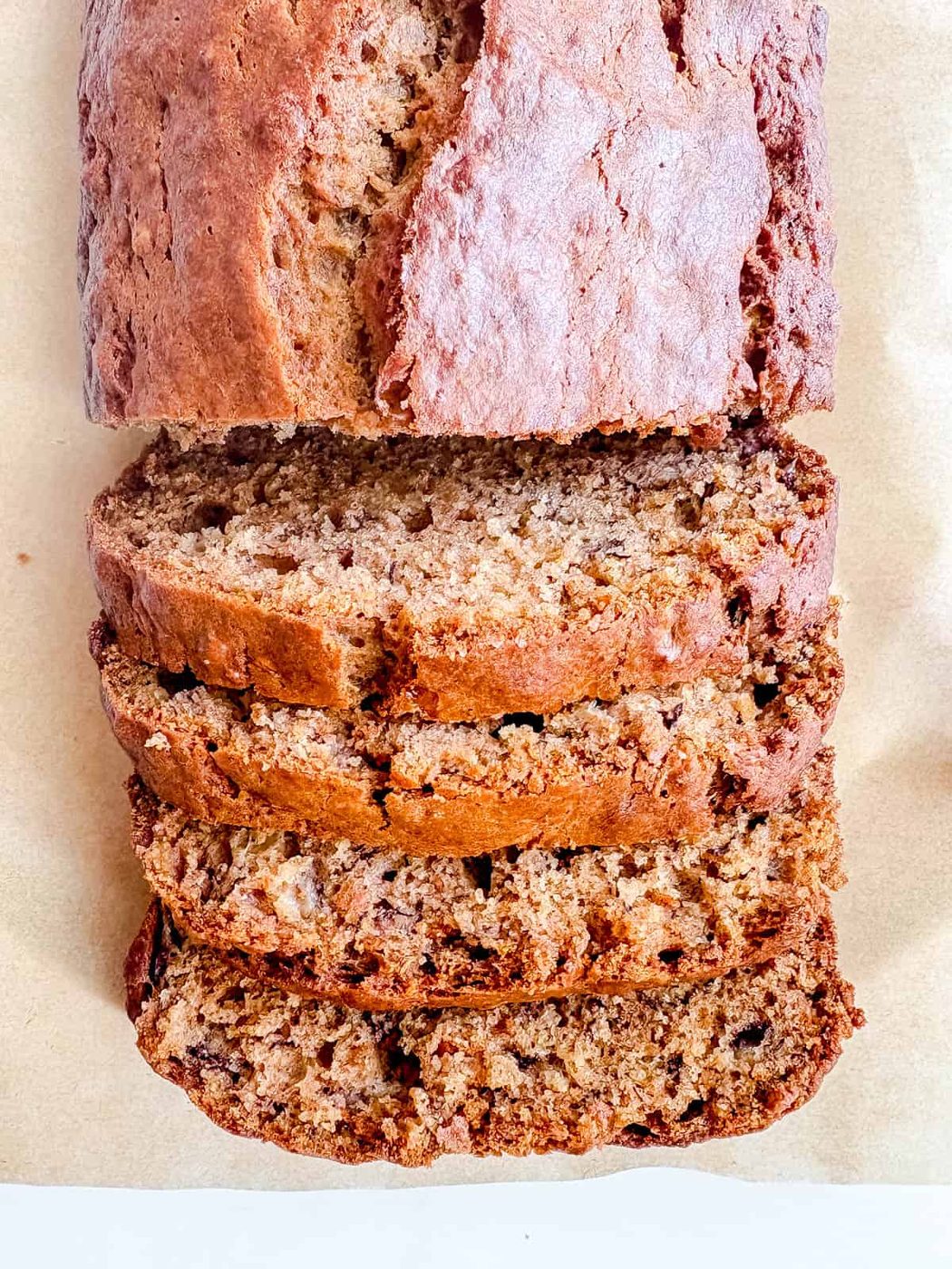 Slices of dairy-free banana bread made with olive oil.