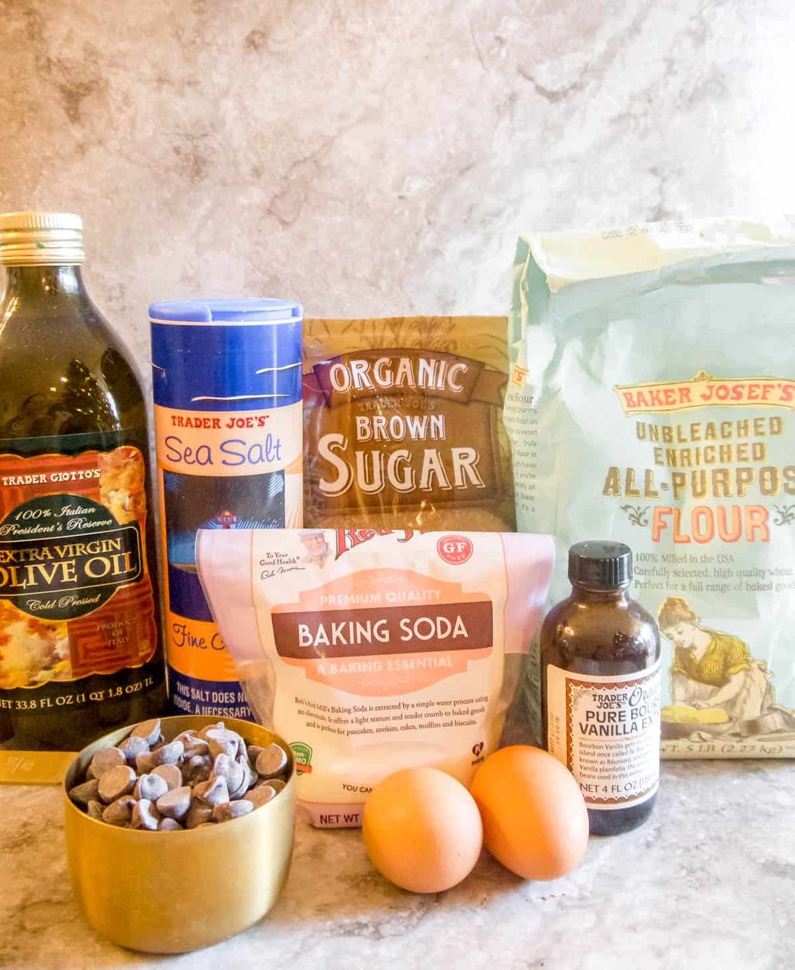 Ingredients needed to make olive oil chocolate chip cookies.