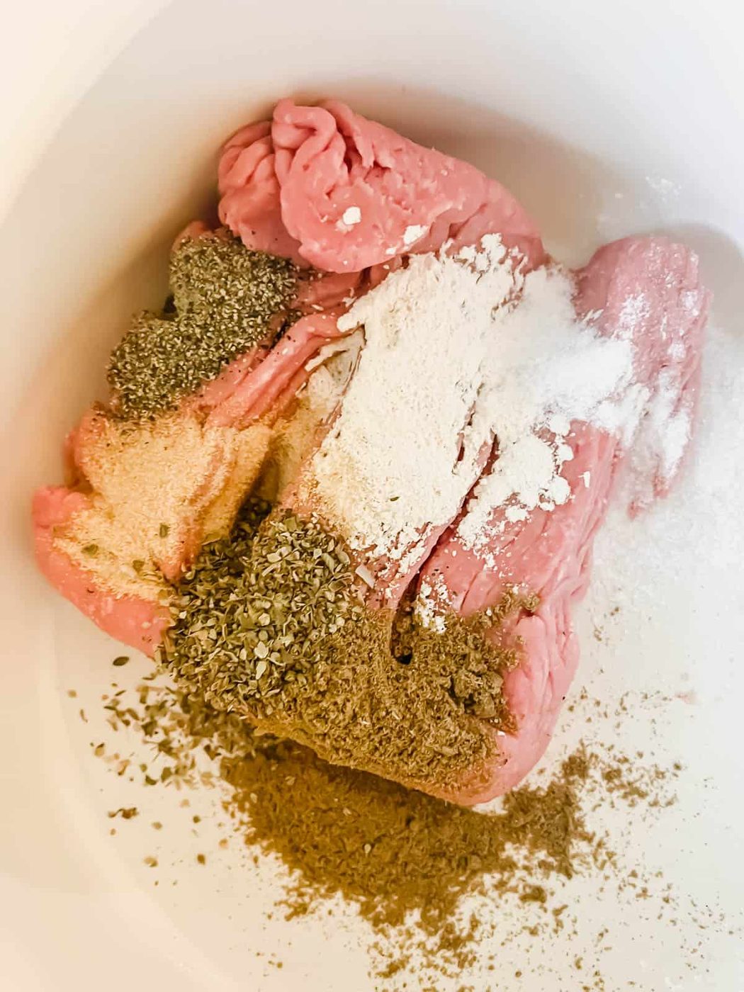 ground turkey in a pot with spices.