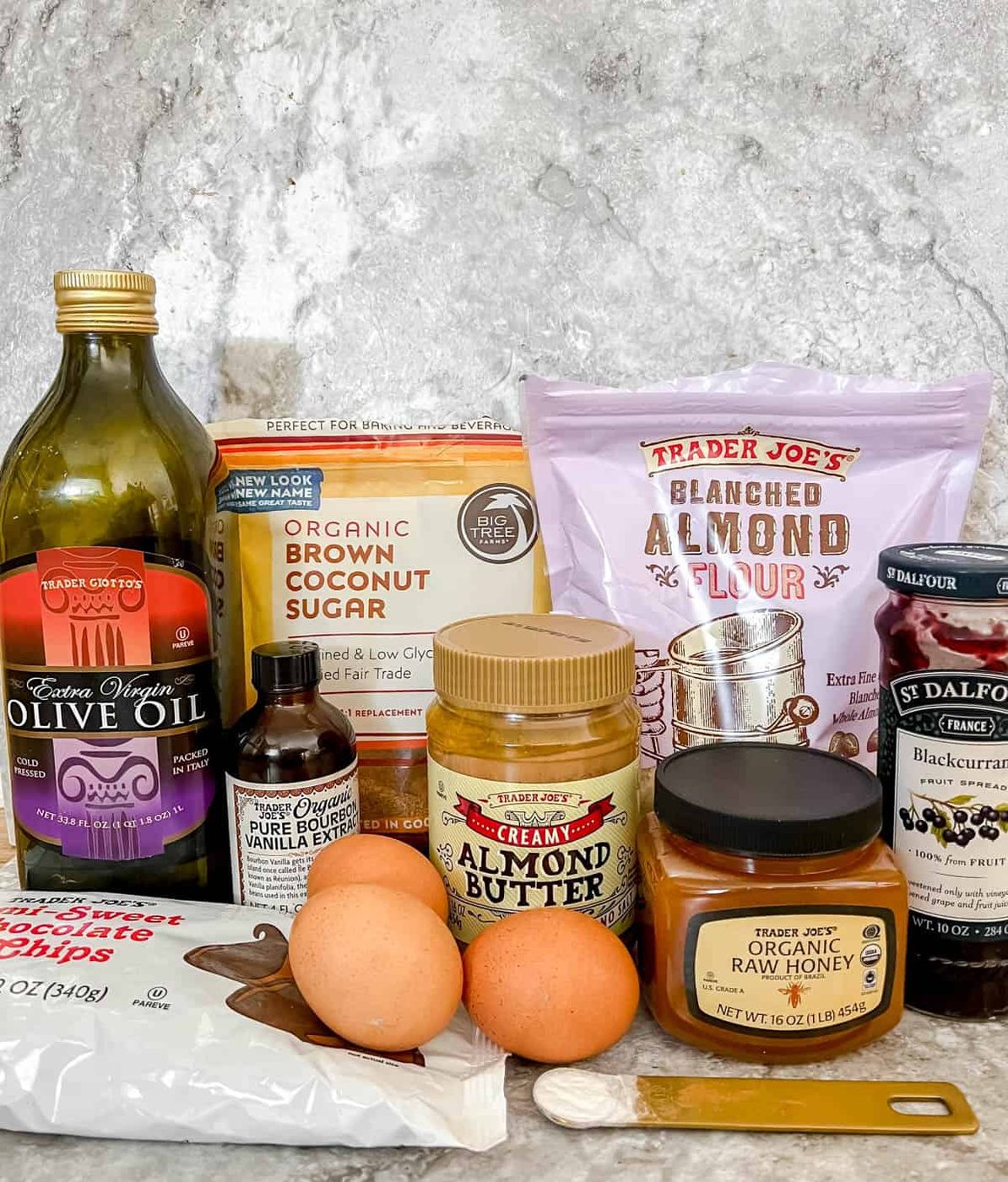 Ingredients needed to make almond butter and jelly brownies.