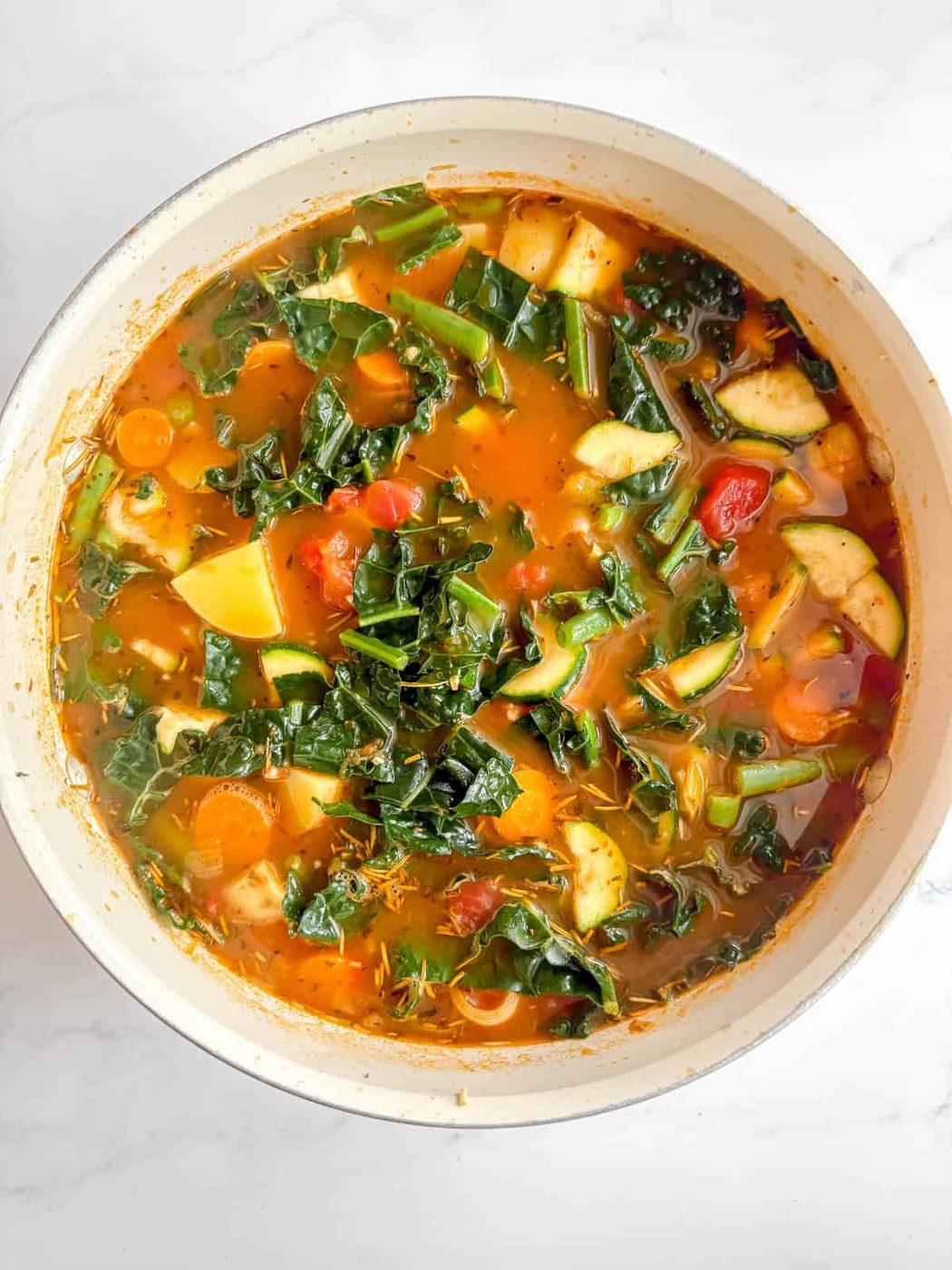 Zucchini, kale, and green beans added to the vegetable soup.