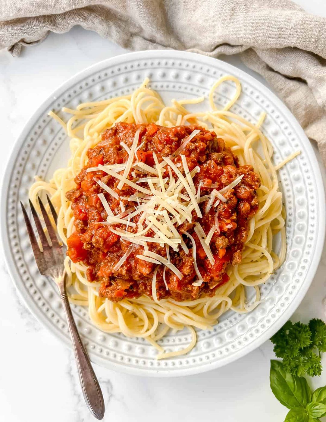 Bison meat sauce on top of spaghetti.