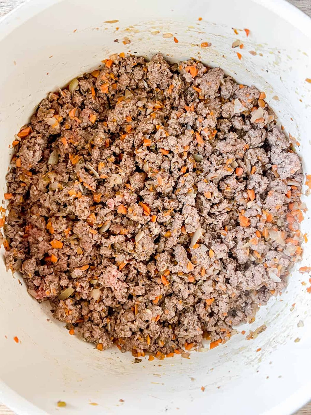 Browned bison in a pan.