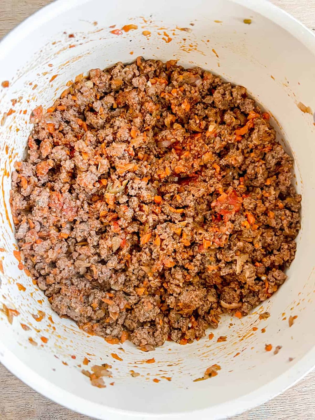 Tomato paste mixed into the bison.