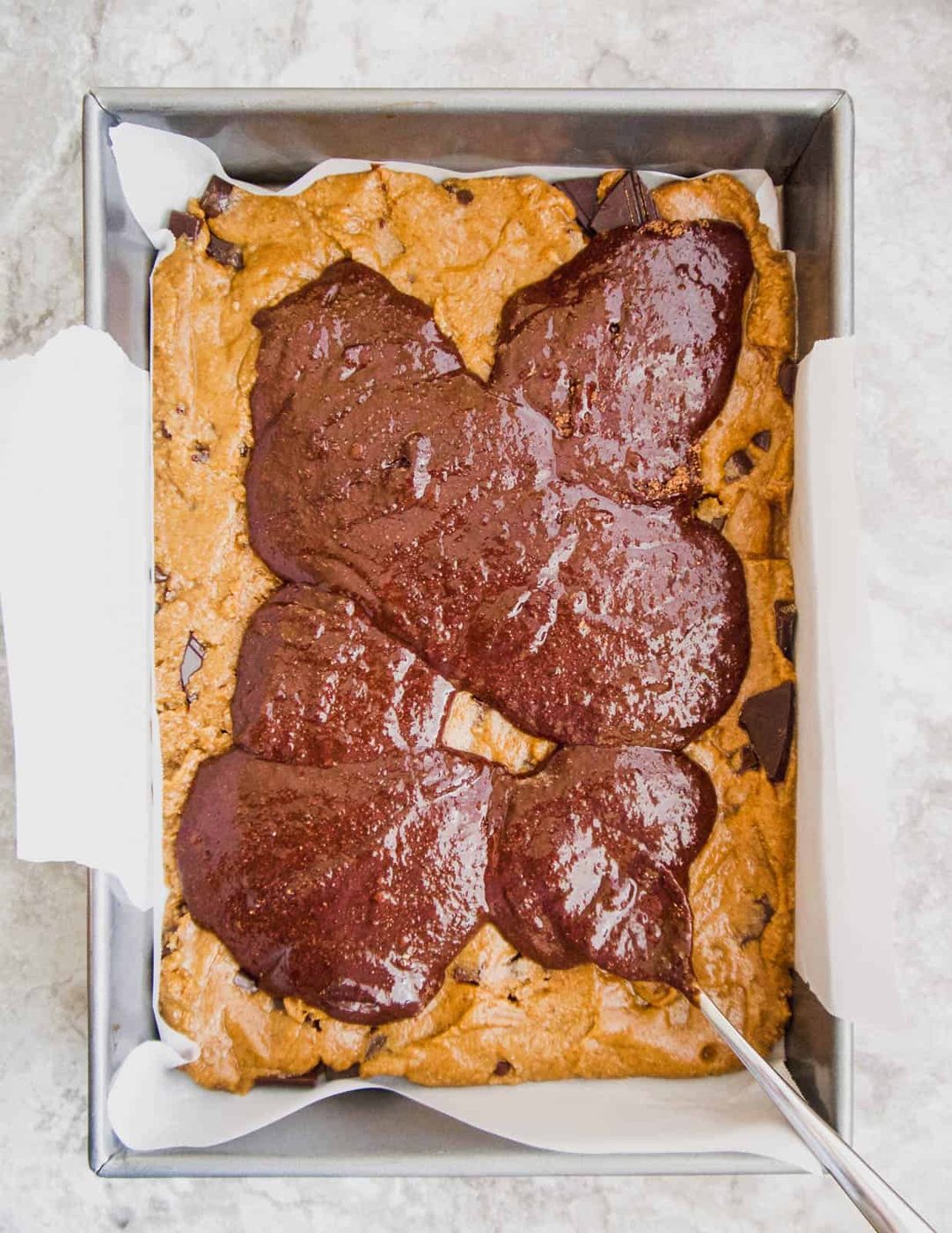 Brownie batter layer on top of cookie layer.