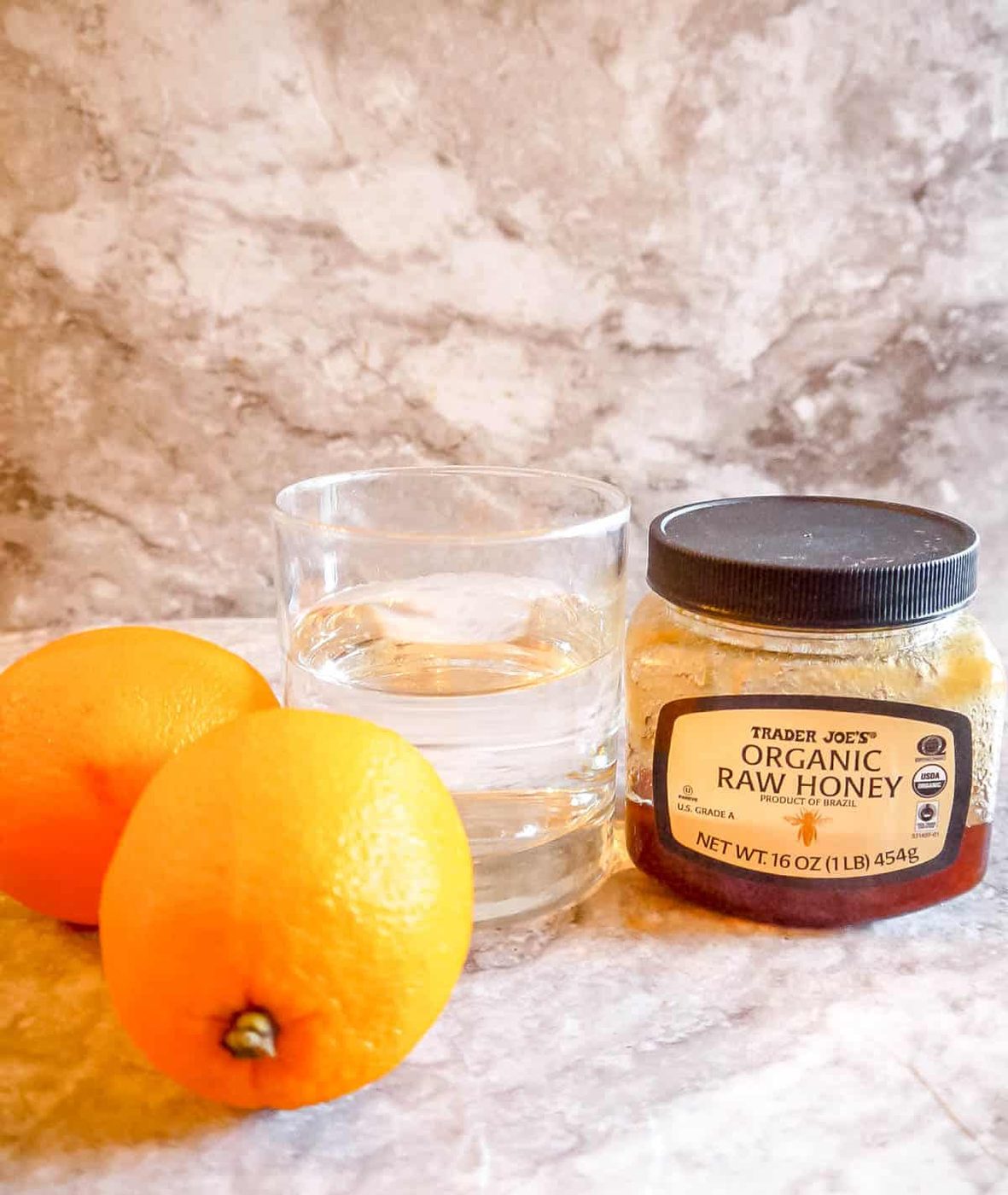 Ingredients needed to make candied orange peels.