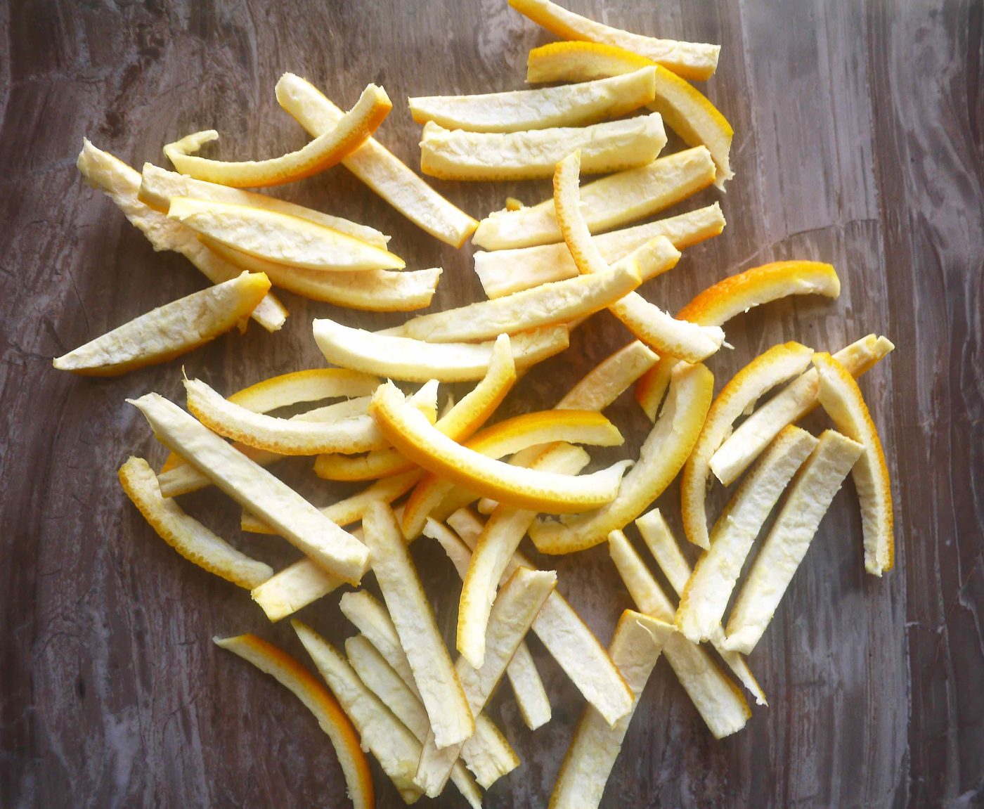 Strips of orange peels cut up.