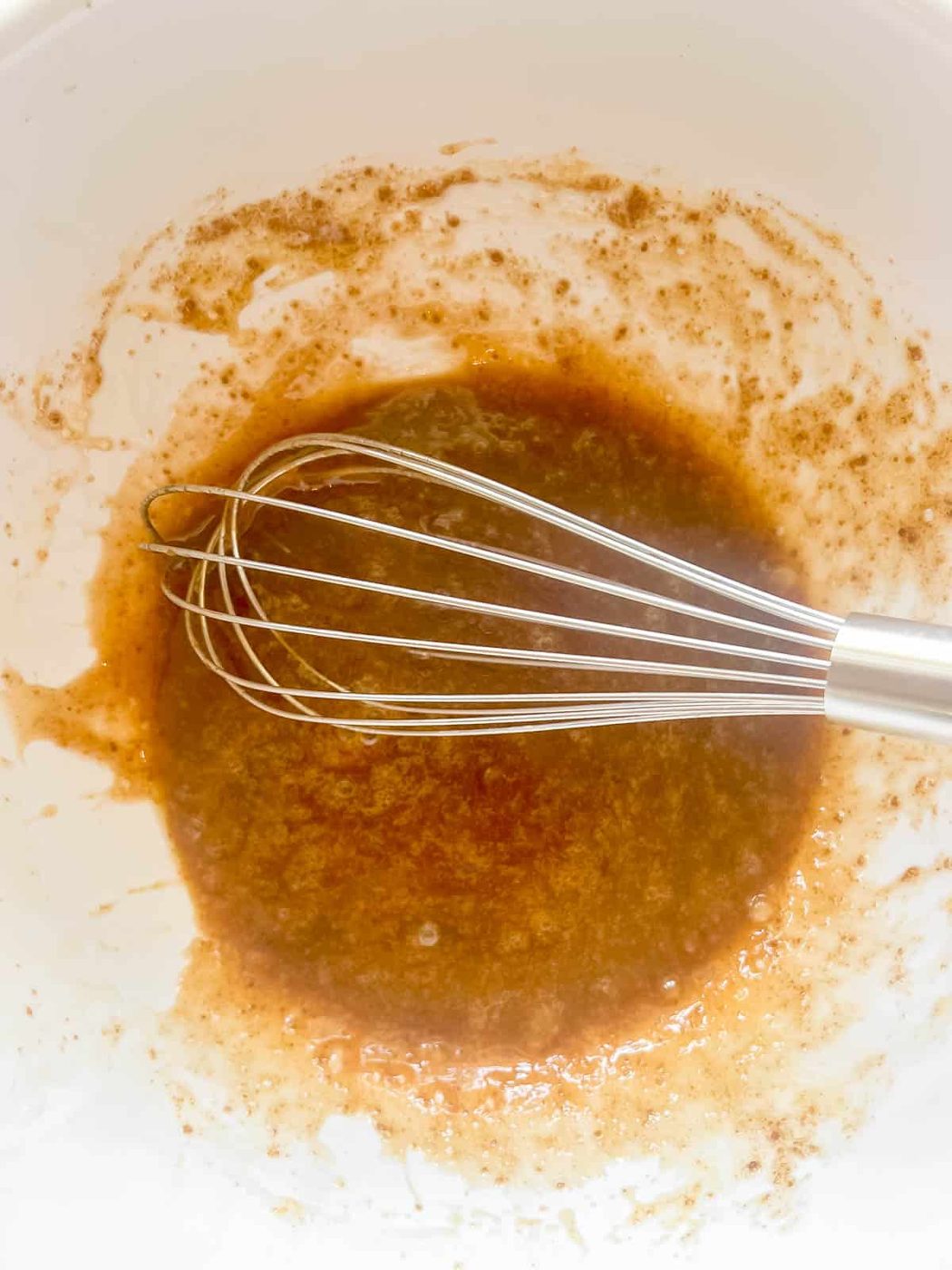 Carrot banana bread wet ingredients in a bowl.