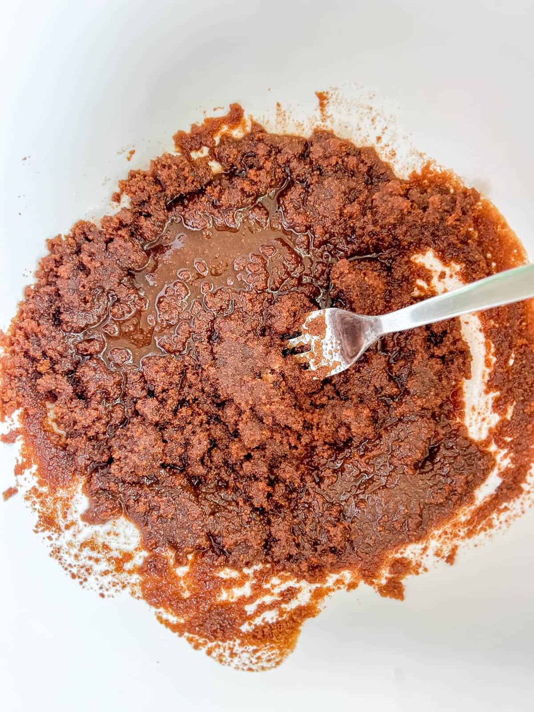 Coconut sugar mixed into oil.