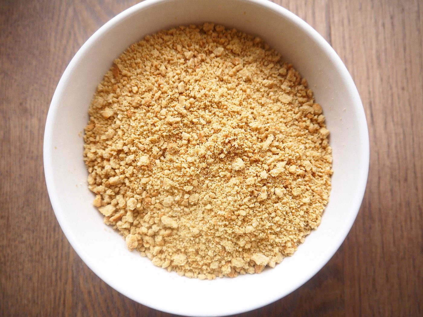 Paleo vanilla cookies crushed up in a bowl.