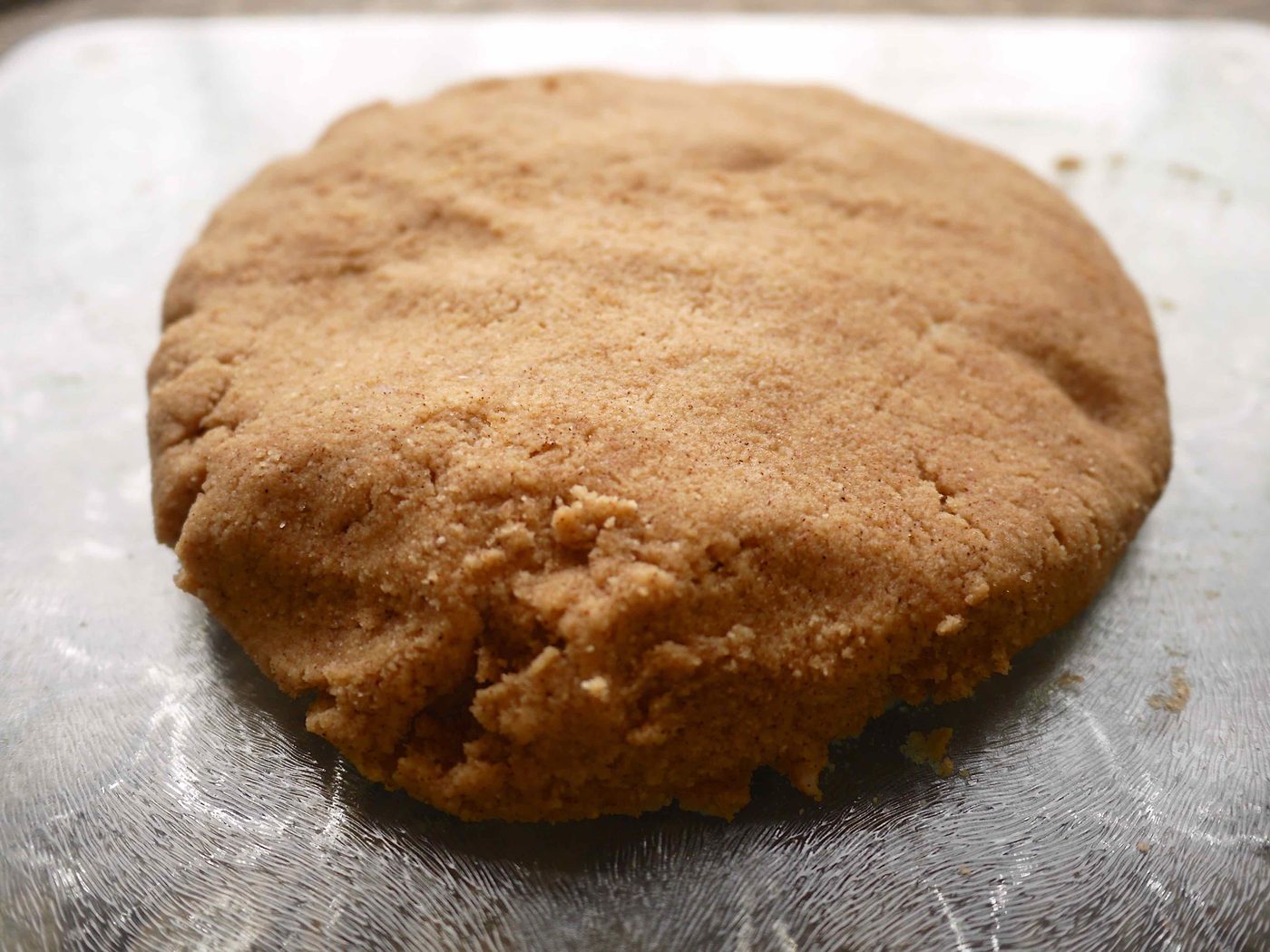 Paleo scone dough on a cutting board.