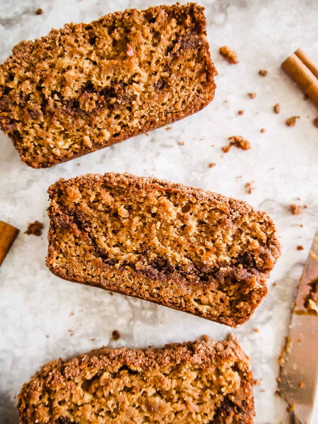 A slice of paleo coffee cake on a table.